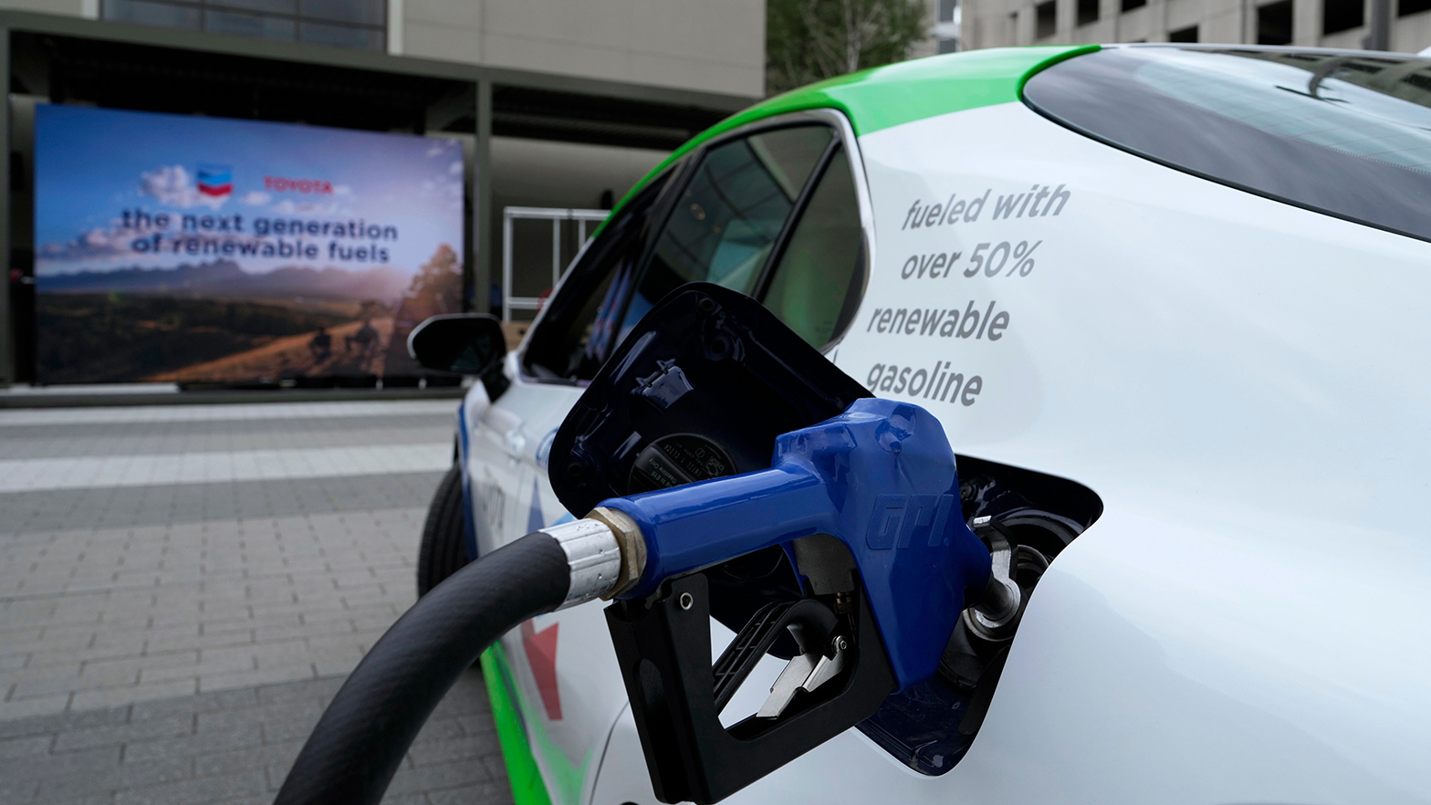 RGB gas nozzle filling up car