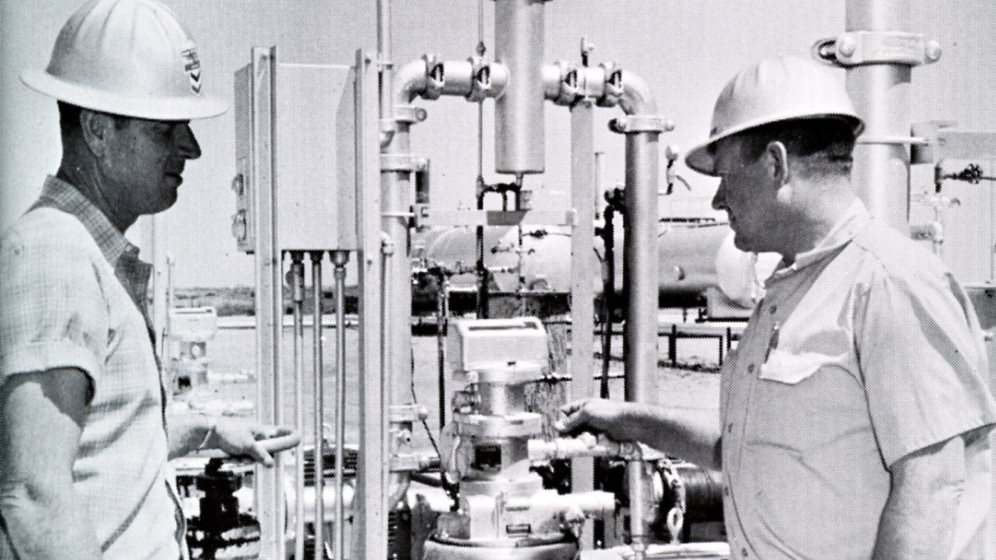 From the Yas Marina historical archive. Two engineers work on carbon capture equipment at the SACROC oil recovery field. 